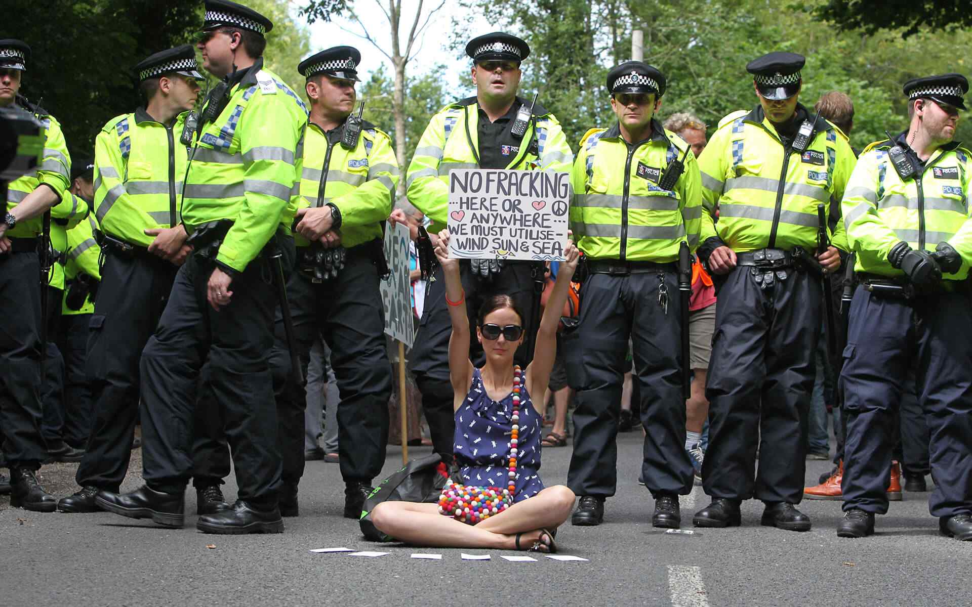 https://newfrontierdemocraticclub.org/wp-content/uploads/2019/03/woman_protest-1.jpg